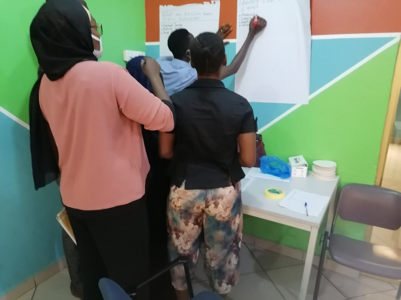 Participants working together on a collaborative exercise