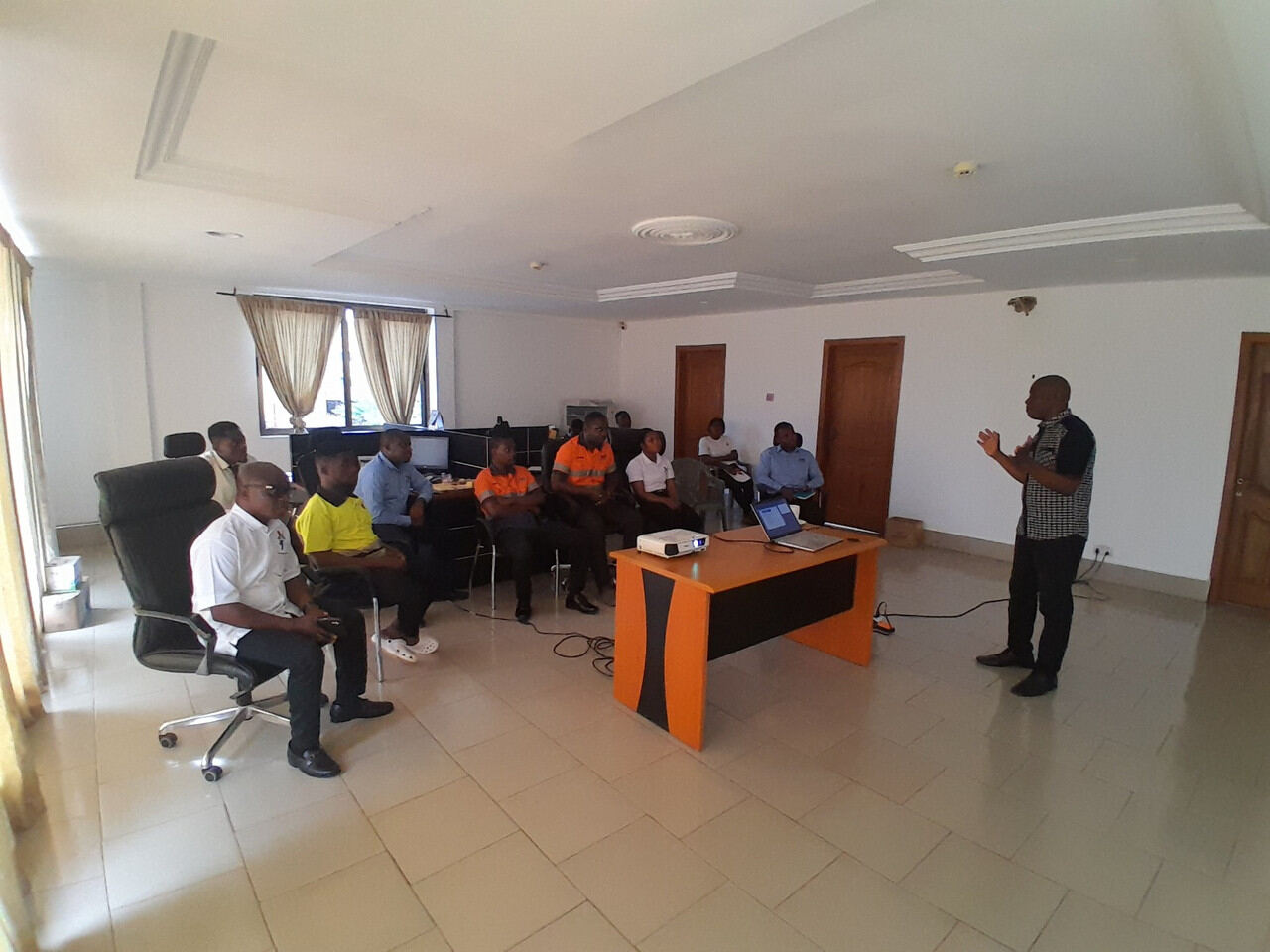 Professionals seated during an executive training session