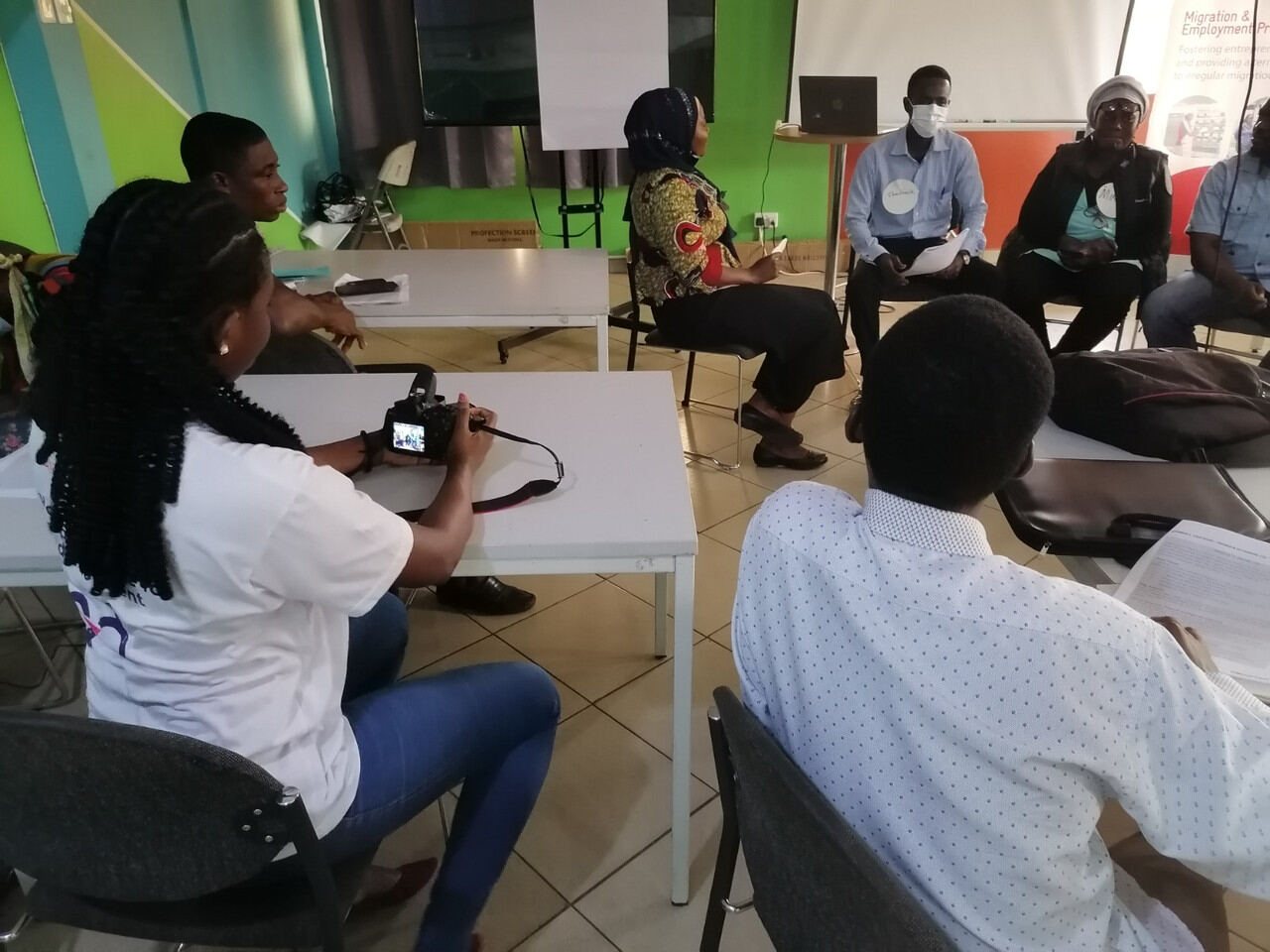 Facilitator guiding a group discussion