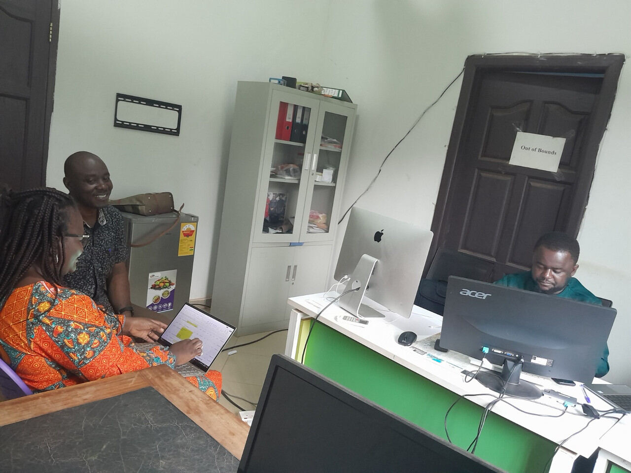 Consultant in discussion with a client across a desk