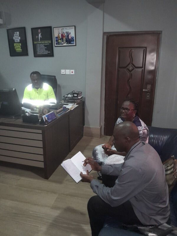 Colleagues reviewing documents together in an office