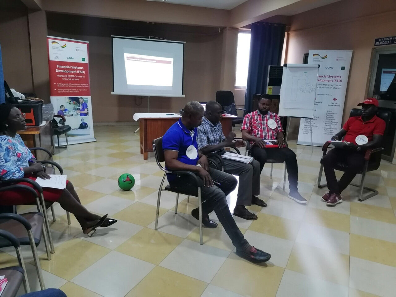 Presenter delivering a session to a seated audience