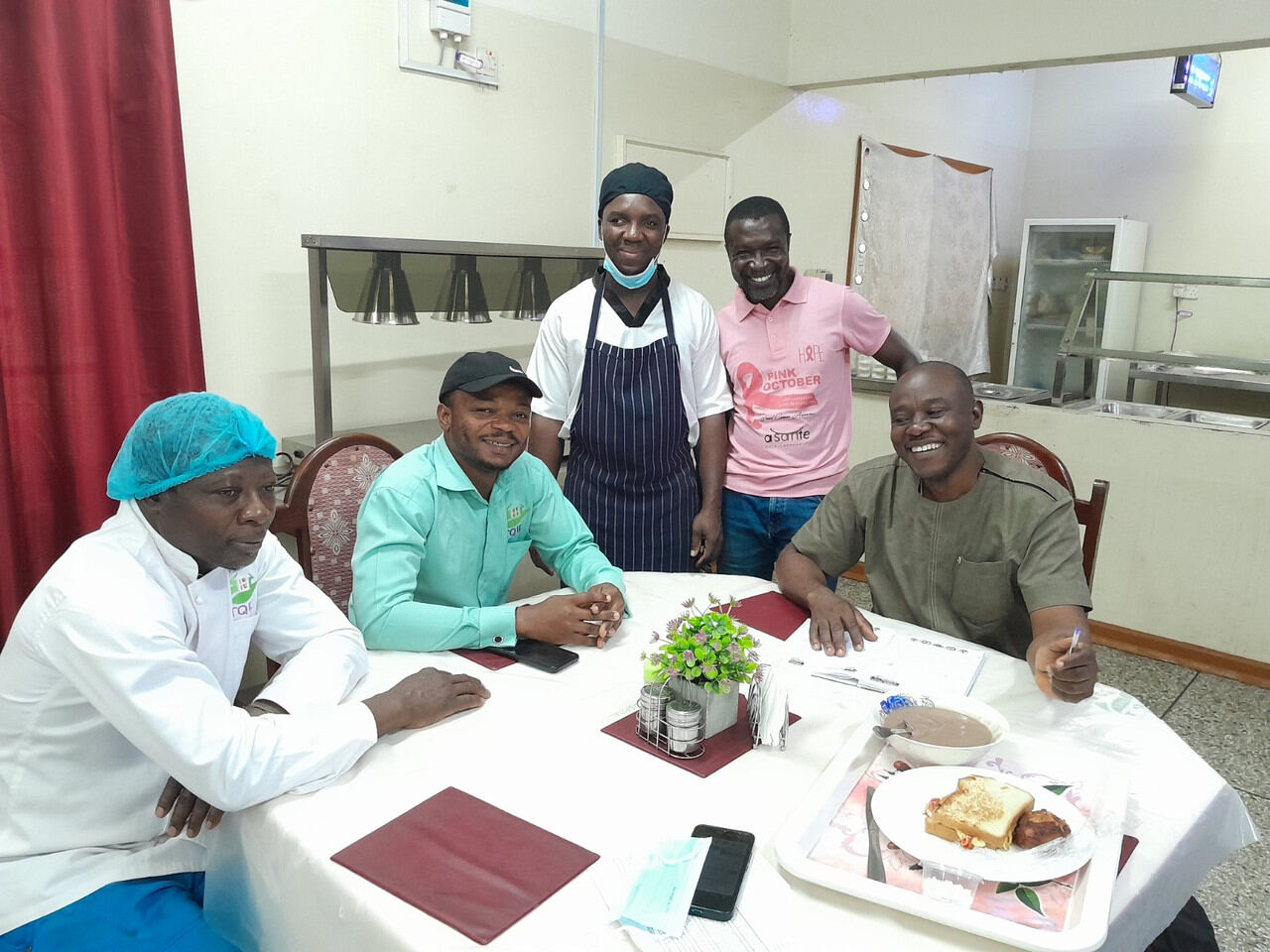 Team members engaging with one another during a working session